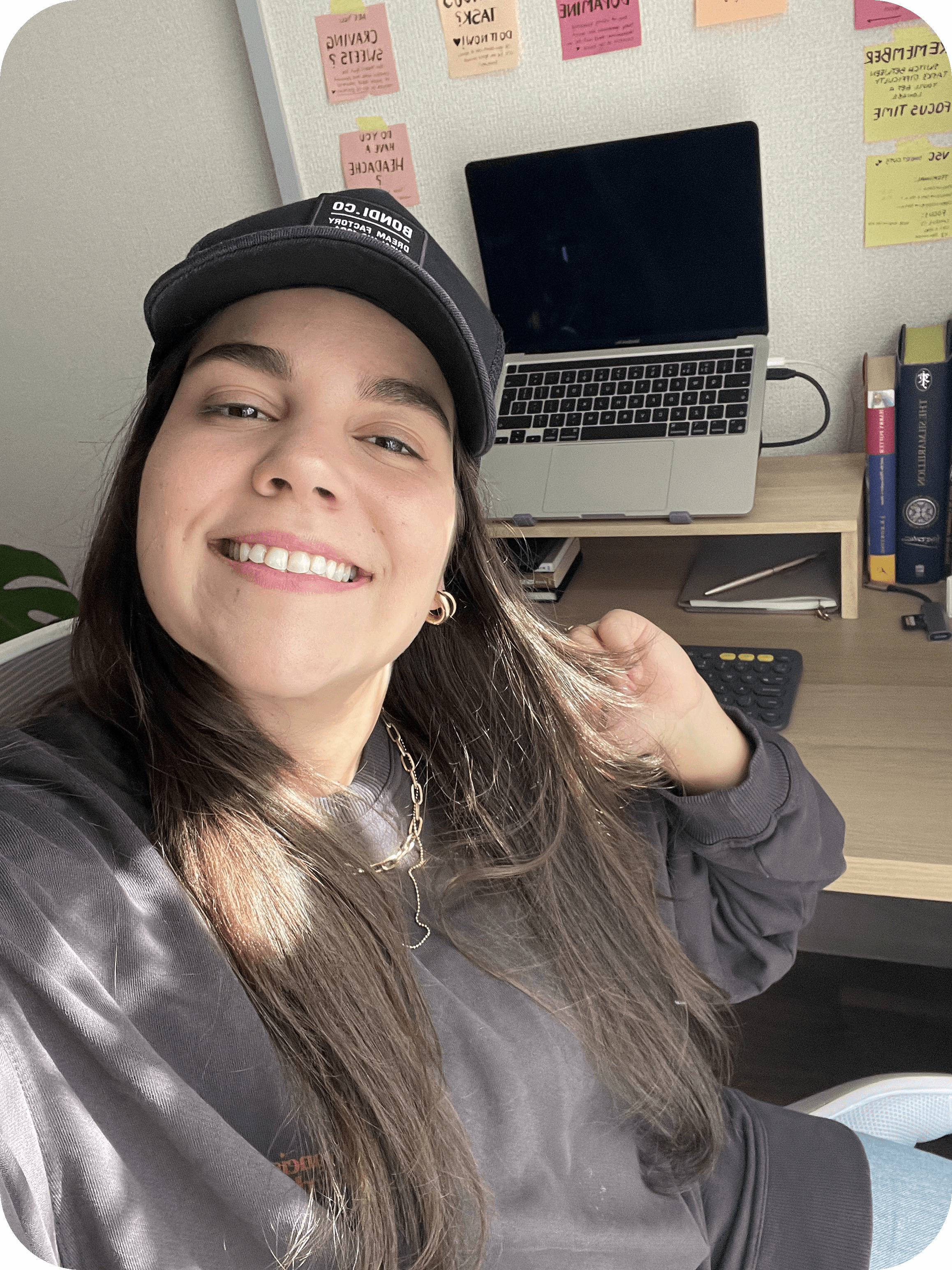 Ana in front of a desk